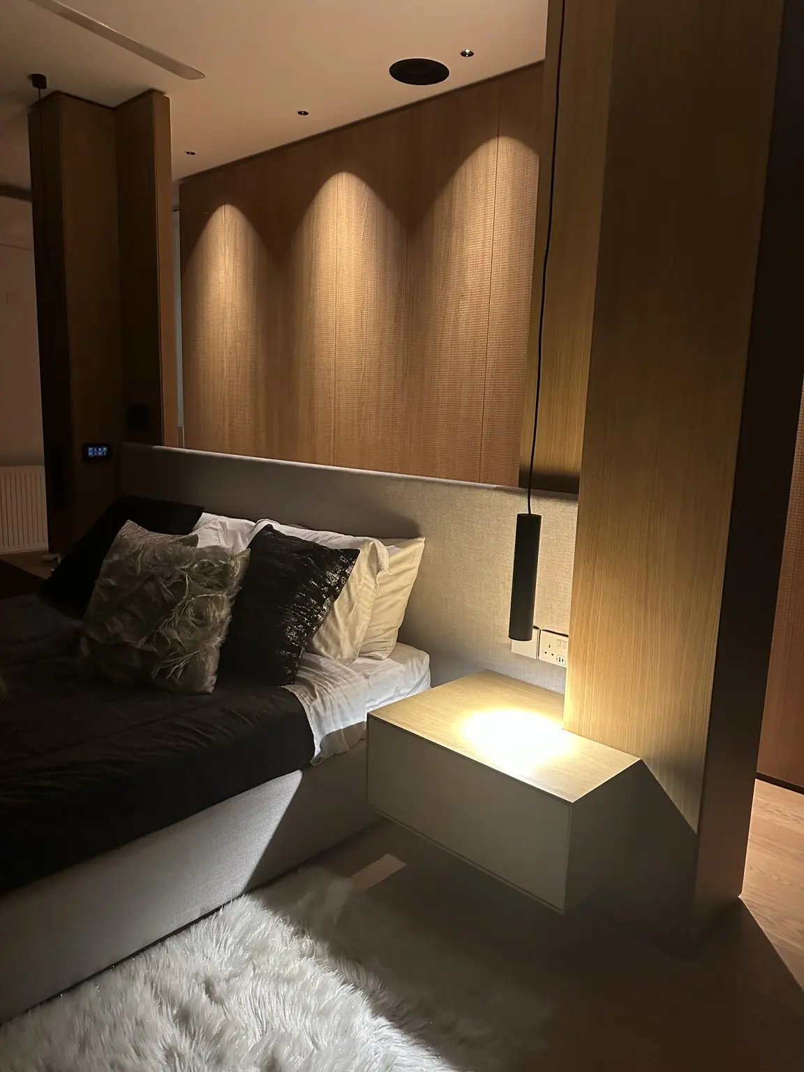 Mnasos Villa bedroom with coordinated architectural lighting and smart controls