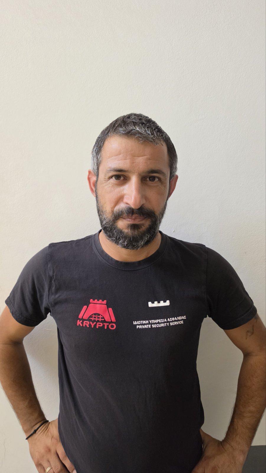 Pambos Toffaris wearing a Krypto private security service uniform